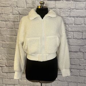 Juniors cropped cream fleece zip up sweater